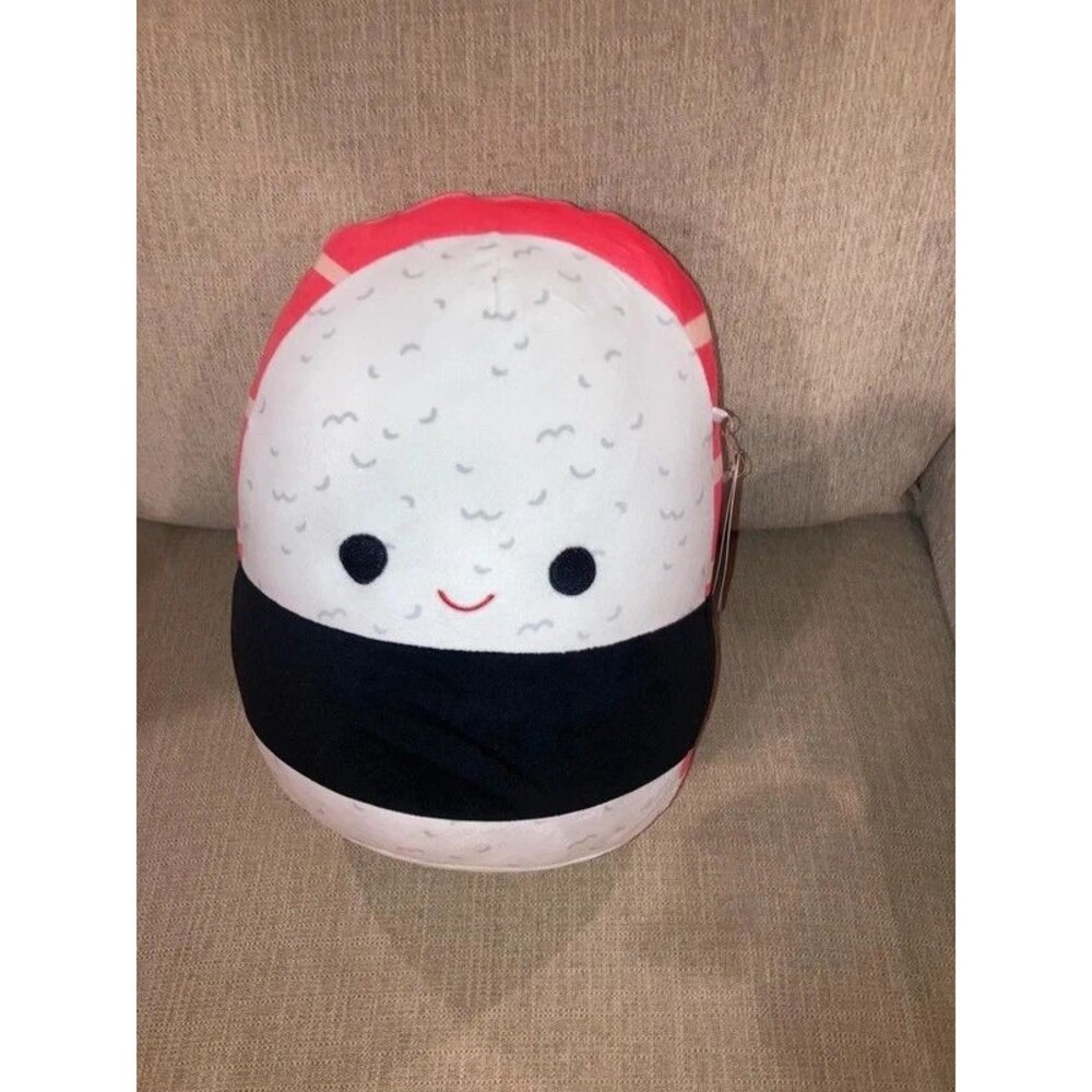A sushi roll stuffie Squishmallow stuffed animal squishy pillow